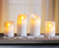 Preview: LED Wachskerze 4er Set weiss rustic beweglicher Flamme D:7cm / 2x H:10cm + 2x H:15cm